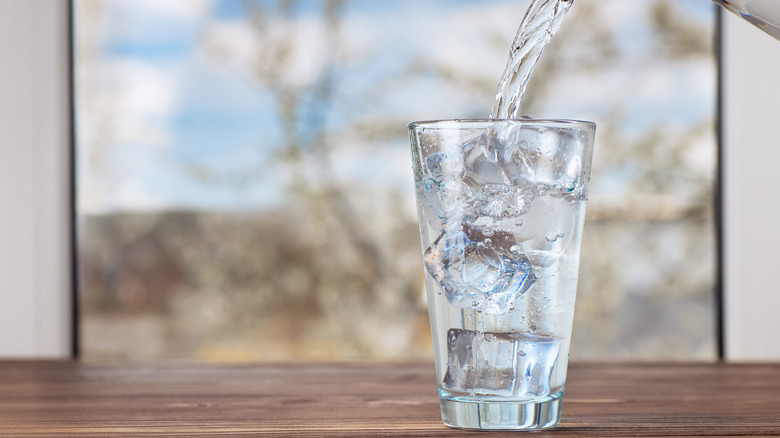 glass of water on wood table