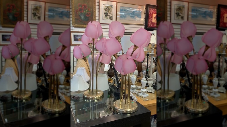 Vintage Harris Industries lamps with pink floral shades in thrift store