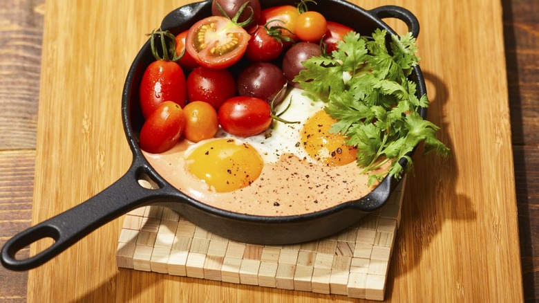 skillet on a wooden trivet