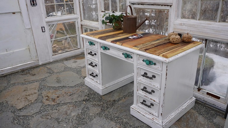 Old bedroom vanity turned into a garden potting station.