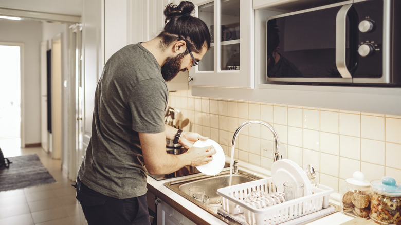 Man washing the dishes