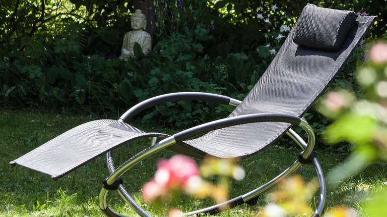 Zero-gravity chair reclined in garden