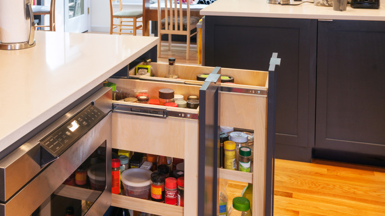 Custom pull-out kitchen drawers with spices