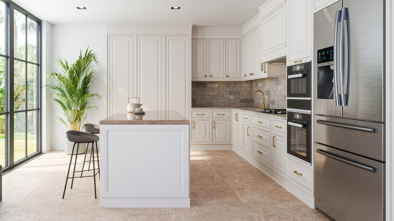 All-white modern kitchen with center island
