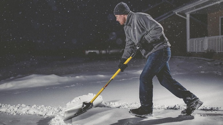 The Snowplow Original Snow Pusher in action