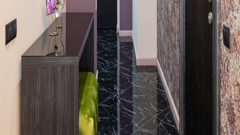 deep liliac color on hallway accent wall