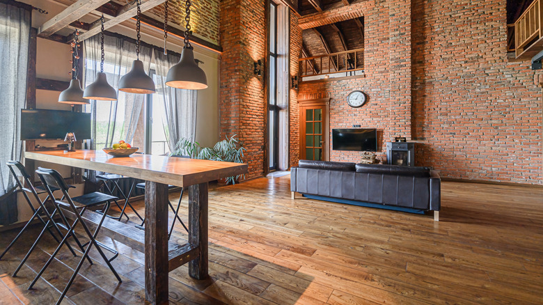 spacious loft with exposed brick walls