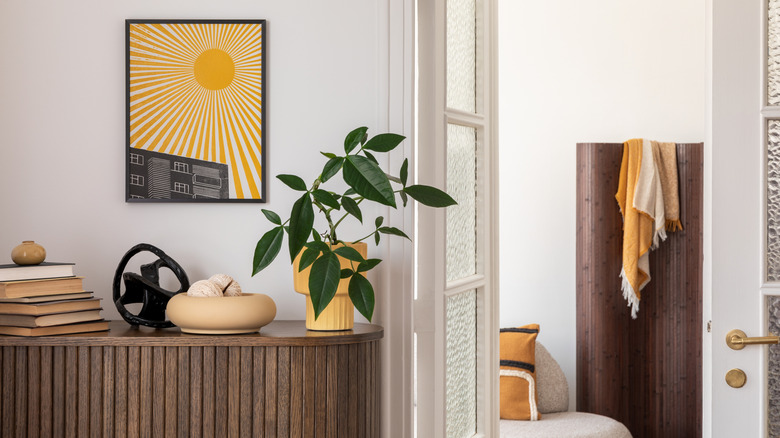 Entryway with stone bowl on wooden table