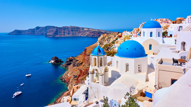 white and blue buildings in Santorini