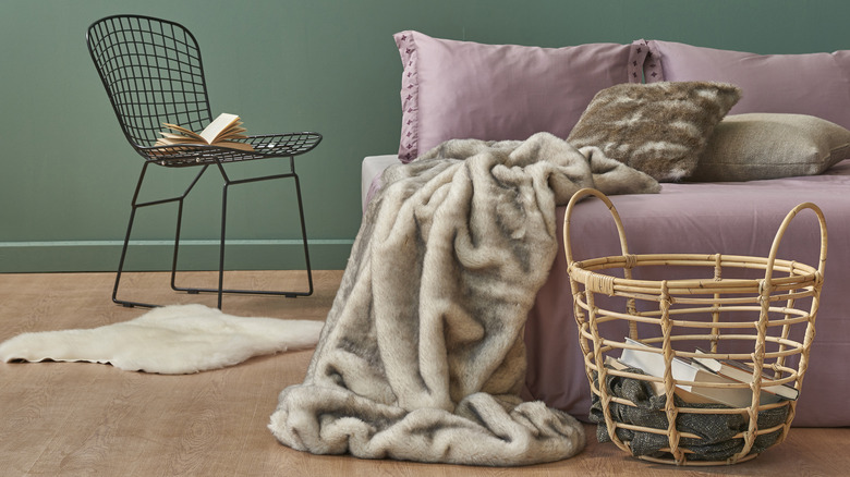 Green bedroom with purple bedding
