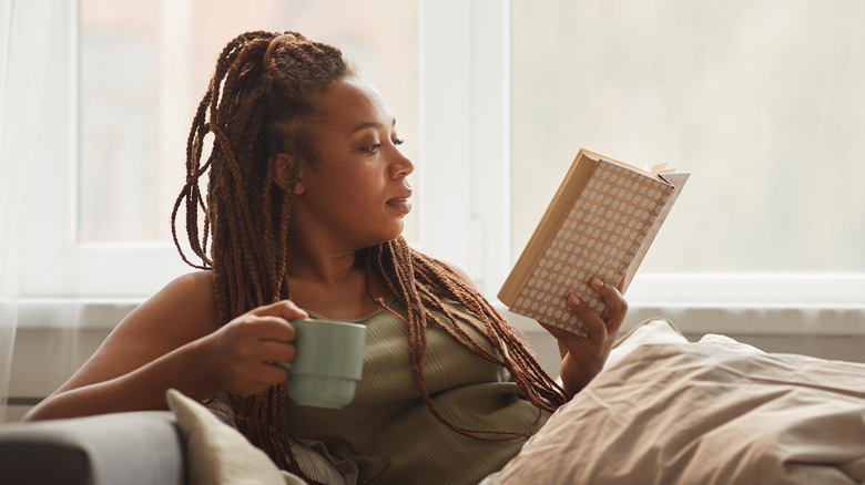 Person reading in bed