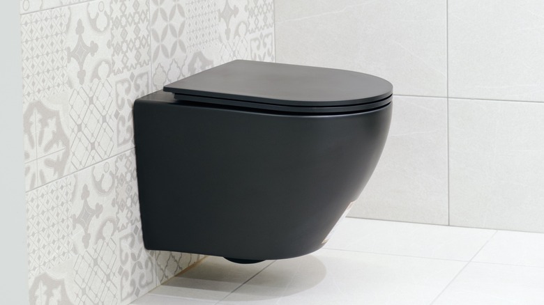 wall-hung black toilet