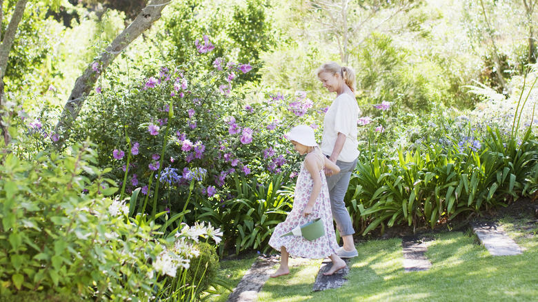 mother and daughter in garden