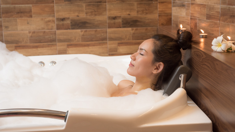 woman relaxing in bath
