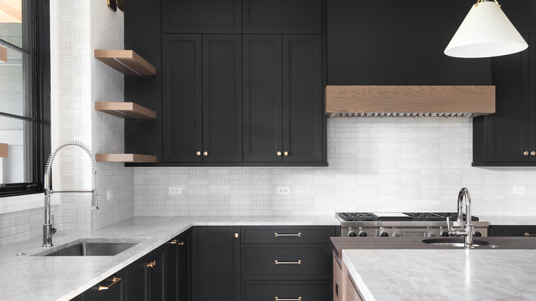 black cabinets with white counter