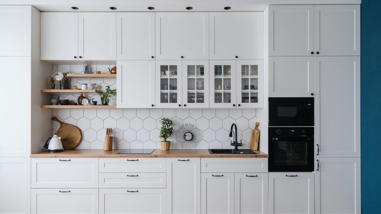 White kitchen with wood countertops