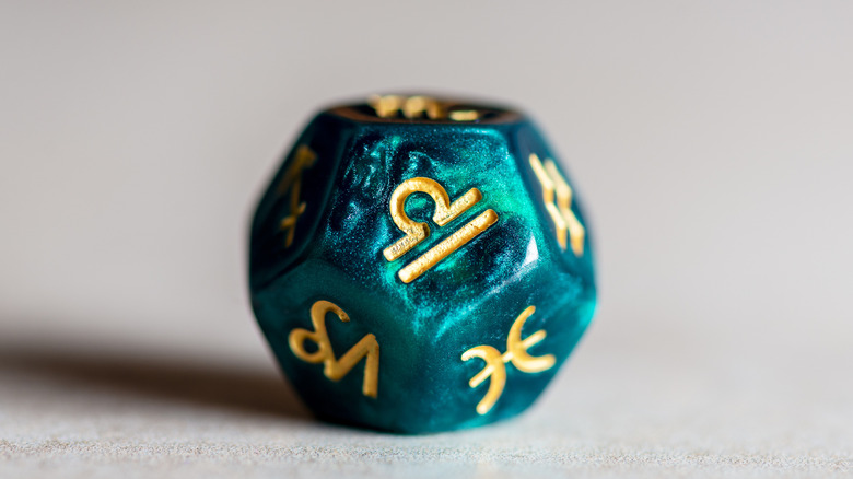 Die with Libra face