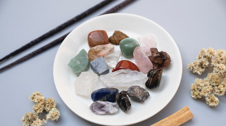 Dish full of healing crystals