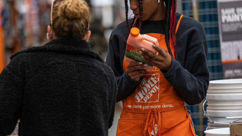 home depot employee helping customer