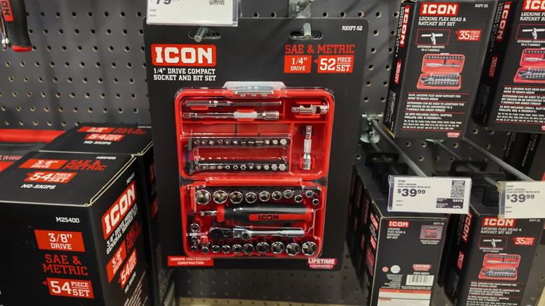Icon wrench tools hanging on a sales wall with price tags