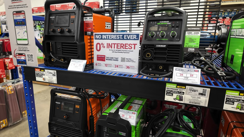 Generators on a shelf in a Harbor Freight store with sales tags