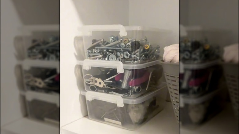 Stack of Dollar Tree lock-top boxes filled with tools