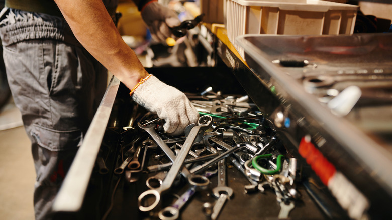 A drawer of messy tools