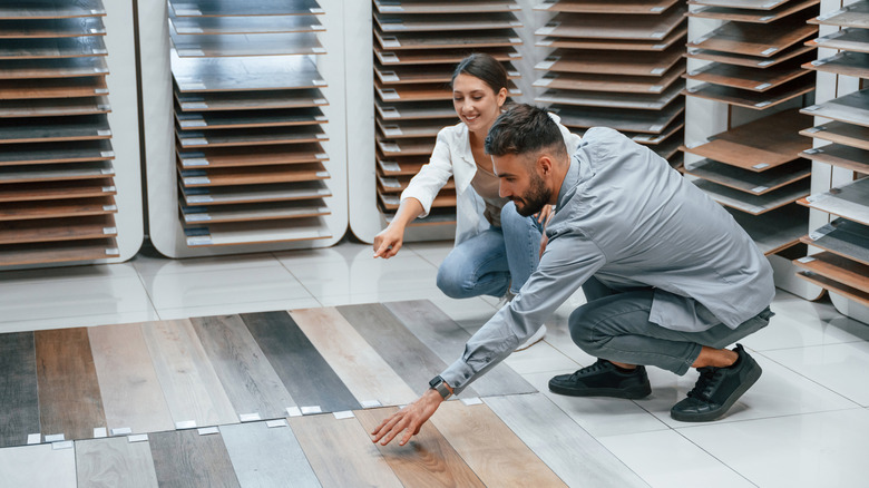 Man and woman shopping for flooring