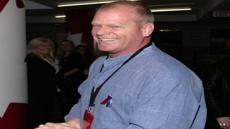 Mike Holmes smiling at an event