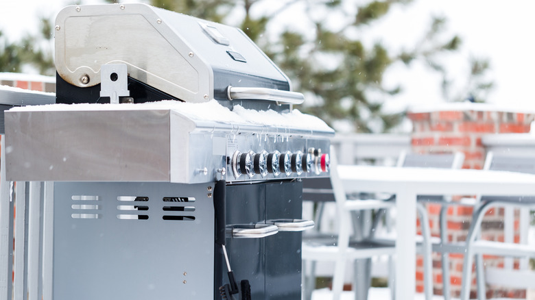 Grill covered in snow