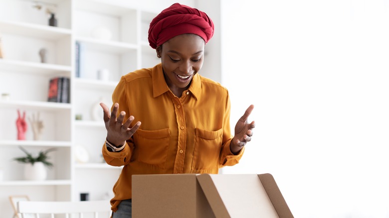 Woman opening present