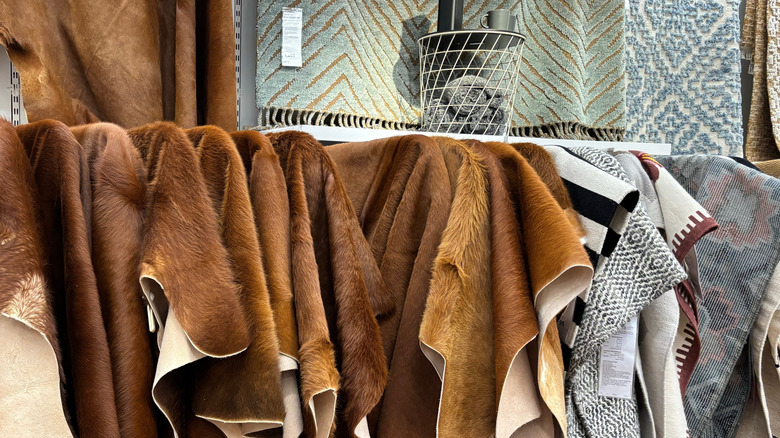 A selection of rugs on sale at an IKEA store