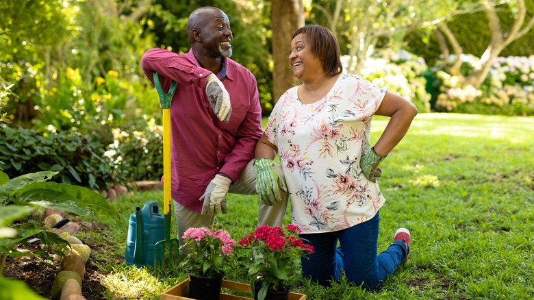 Couple gardening together