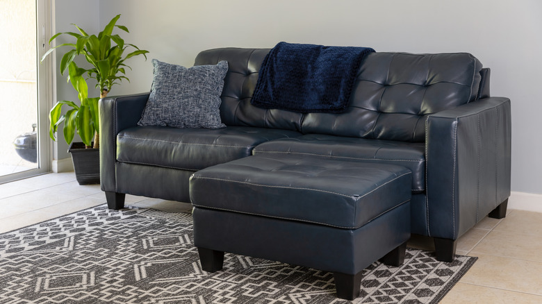 leather ottoman and leather sofa