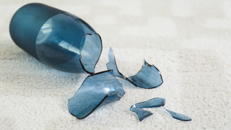 broken glass on carpet