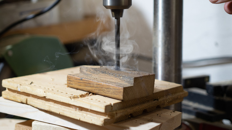 dull drill bit burning wood