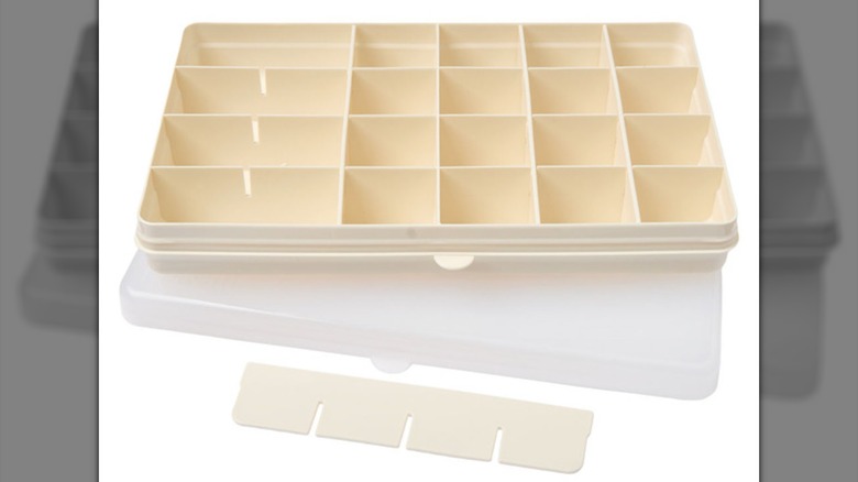Cream-colored snack box with many compartments