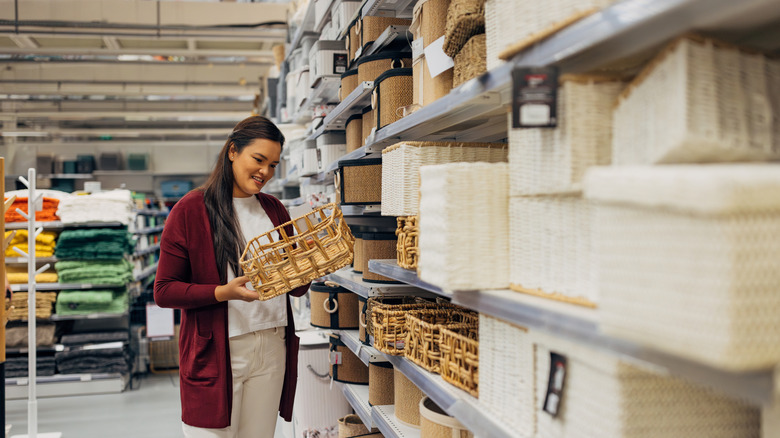 woman shopping for baskets in store