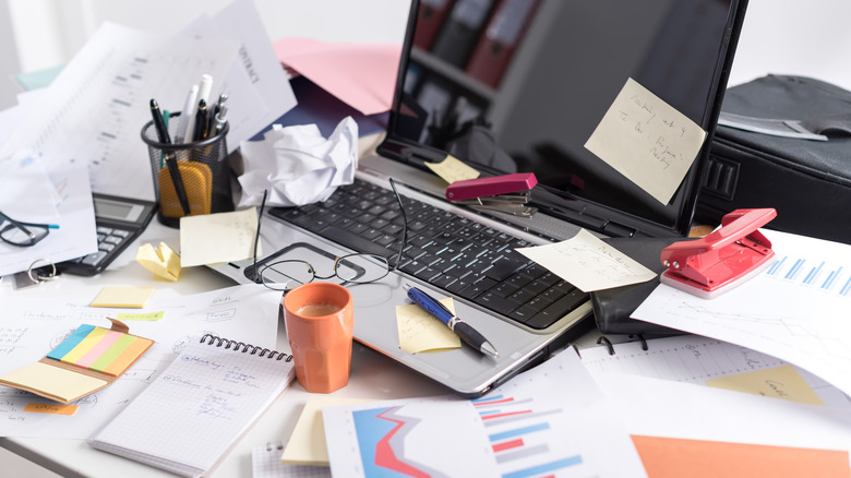 Cluttered office desk