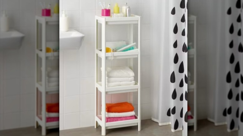 white shelving unit in bathroom