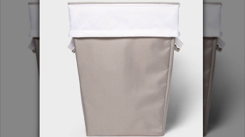 gray hamper with white liner