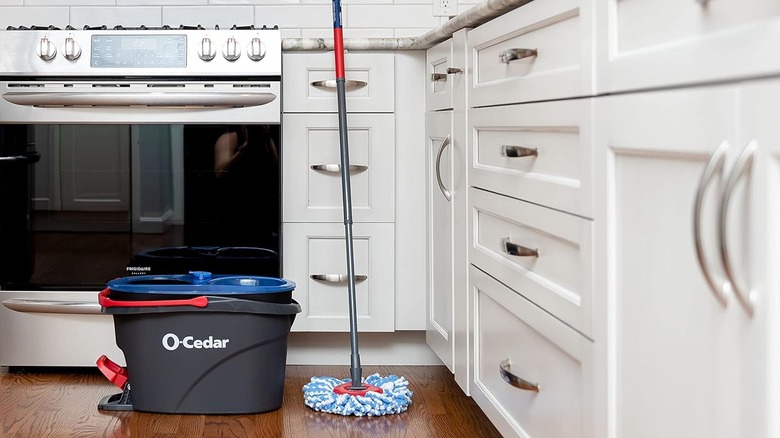 O-Cedar RinseClean Spin Mop & Bucket System in a kitchen