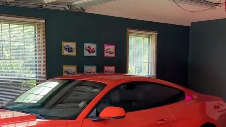 blue garage with red car
