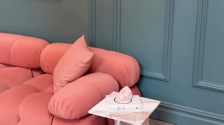 blue walls with pink couch