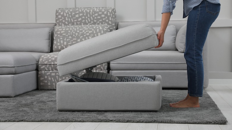 gray sectional with storage ottoman 