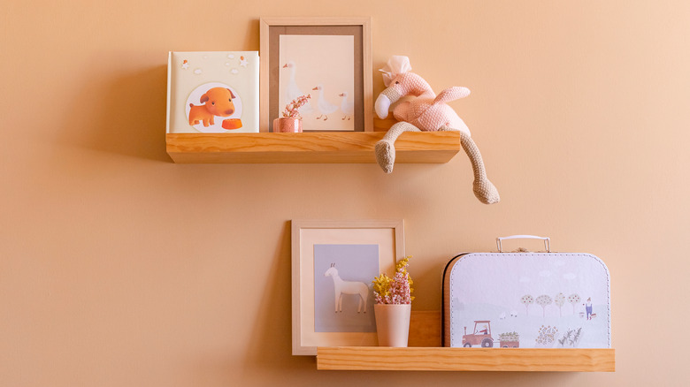 books displayed on floating shelves