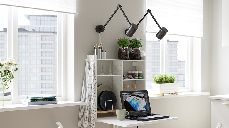 An IKEA NORBERG Wall-Mount Drop-Leaf Table with Storage