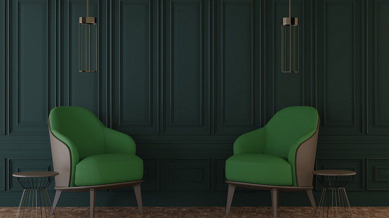 Room with forest green panelling