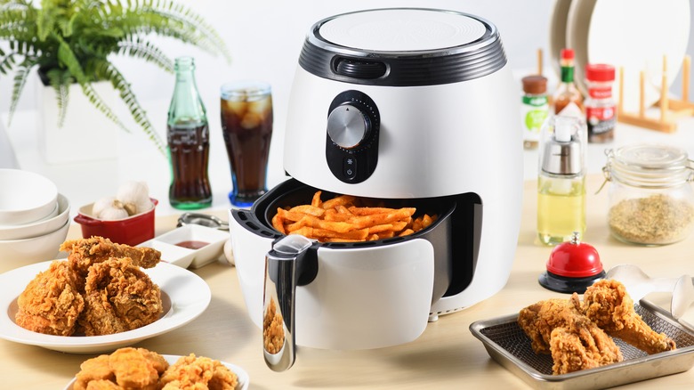 Air fryer containing french fries 
