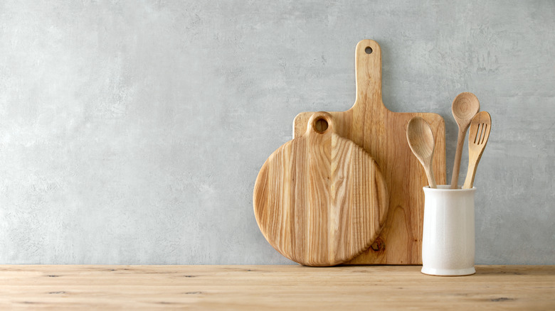 Wooden utensils on a wooden countertop 